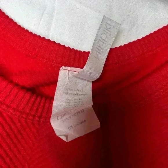 I’m selling a red Nikibiki crop top. - Picture 3 of 4